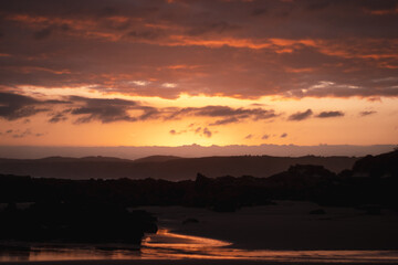 Fototapeta na wymiar A beautiful pink sunset on a beach in the Eastern Cape, South Africa.
