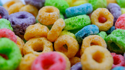 Colorful fruit sugary corn cereal rings. Highly detailed macro close up shot of this nutritious and delicious breakfast and snack favorite. 
