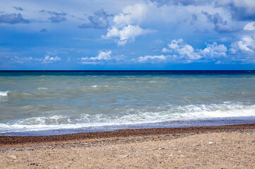 Cloudy sky over the sea. Beautiful seascape.