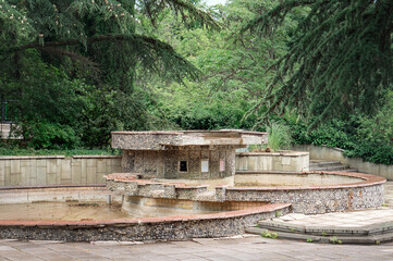 Beautiful old fountain in the park on a summer day. Russia, Yalta.
