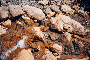Beautiful large stones in the water. Close-up, soft focus.