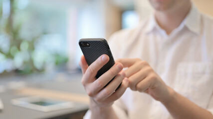 Close up of Man Using Smartphone