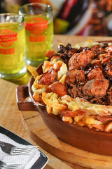 Eating French Fries and Salchipapas 