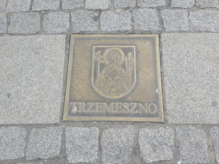 Trzemeszno Coat of Arms on the stones of the main square in Gniezno. Gniezno, Poland.