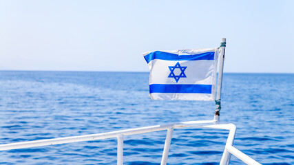 Flag of Israel on front of boat