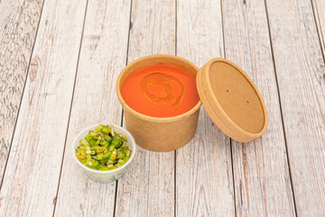 Gazpacho is a cold soup with various ingredients such as olive oil, vinegar, water, raw vegetables, usually cucumbers, peppers, onions and garlic