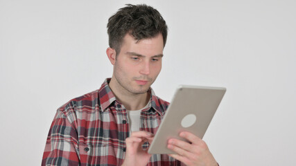 Portrait of Young Man using Digital Tablet