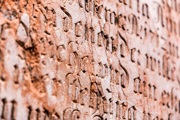 Medieval stone script and carvings on the exterior of Frauenkirche in Munich