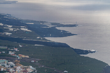 Lava of the volcano in La Palma flowing in the ocean, creating new land surface