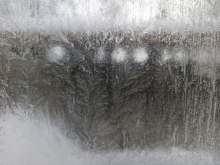 Fototapeta premium Icy frost patterns on the glass. Severe frost.