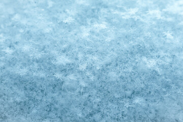 background of many snowflakes in white and blue