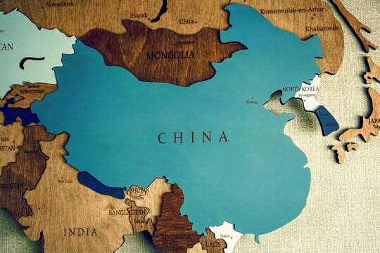 China country on political map. Carved wood