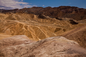 Fototapeta na wymiar Beautiful patterns and ridges in the rocks at Zabriskie Point in Death Valley National Park 