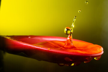 splash photo on spoon with water