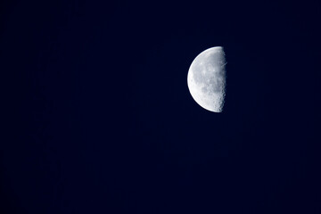 half moon in the night sky