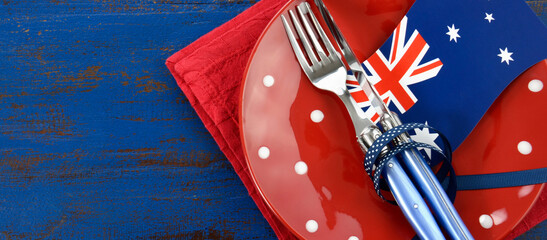 Happy Australia Day, January 26, theme table setting with red polka dot plate and Australian flag...
