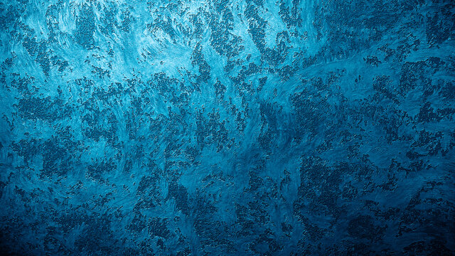 Beautiful decorative Venetian plaster in blue. Plastered wall texture for backgrounds.