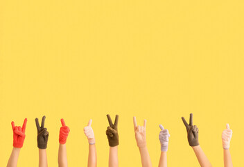 Women in warm gloves showing different gestures on beige background
