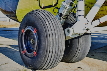 Helicopter landing gear with aircraft thrust pad. Landing gear of military helicopter. Wheel Of...