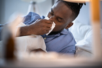 African American Man Blowing Nose