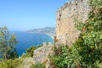 Fototapeta na wymiar Alanian fortress. Fortress wall. Chilarda-Burnu Peninsula. Turkey