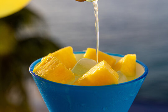 Fresh pineapple in a margarita cocktail on a sunny day in Cozumel, Mexico. 