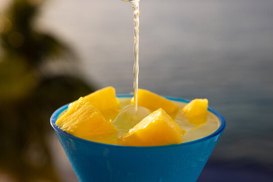 Fresh pineapple in a margarita cocktail on a sunny day in Cozumel, Mexico. 