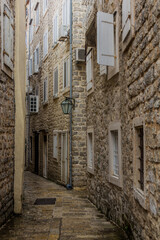 Fototapeta na wymiar Narrow alley in Budva town, Montenegro.