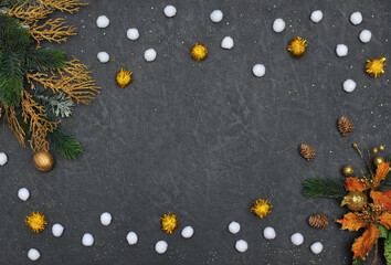  Winter  composition with pine tree branches ,cones ,snowballs on dark grey background.  Free space for writing Flat lay,top view