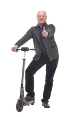 happy casual man with electric scooter .isolated on a white background.