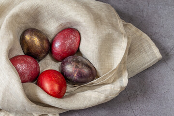 Creative colored eggs.  Easter grey background with copy space