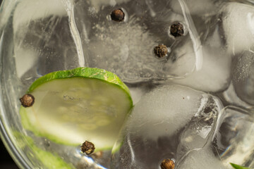 gin or vodka with ice cucumber and pepper