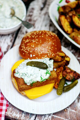 Fillet-o-fish  and chips with tartare sauce.