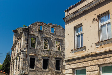 Bullet holes in buildings in Mostar. Bosnia and Herzegovina