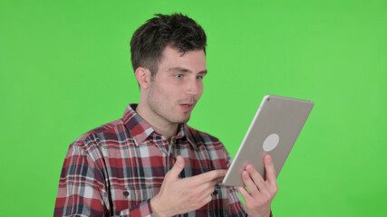 Portrait of Video Call on Tablet by Young Man, Green Chroma Screen