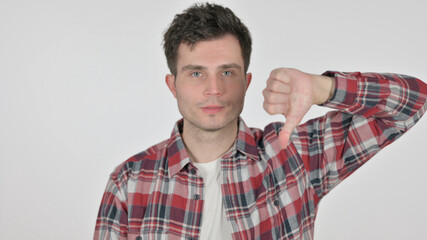 Portrait of Thumbs Down Gesture by Young Man