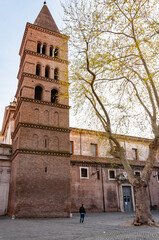 Obraz premium Basilica of St. Chrysogonus Basilica di San Crisogono, IV cent. with a bell tower of XII century in Rome, Italy