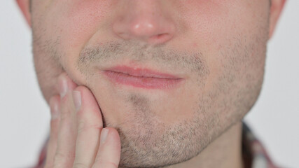 Close up of Young Man having Toothache, Cavity