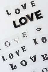 the word "love" in black type on white paper