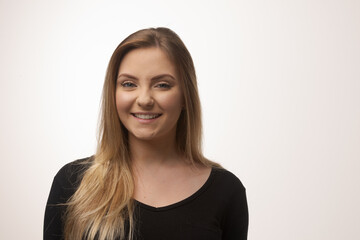 Fototapeta premium Young blonde woman isolated in studio portrait