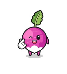 turnip character doing Korean finger heart