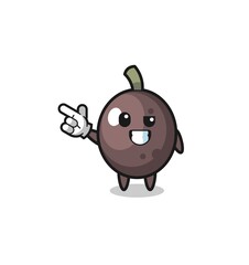 black olive mascot pointing top left