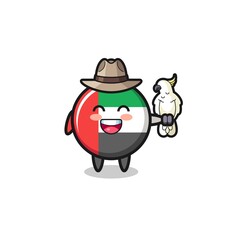 uae flag zookeeper mascot with a parrot