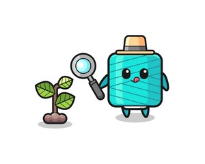 cute yarn spool herbalist researching a plants