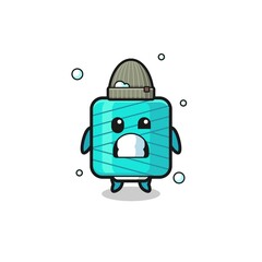 cute cartoon yarn spool with shivering expression