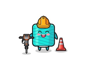 road worker mascot of yarn spool holding drill machine