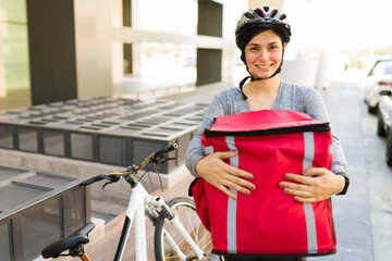 Delivery girl with a red backpack