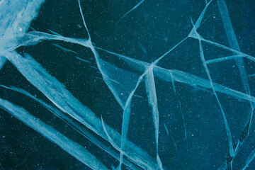 Texture of winter ice surface. Blue natural ice background