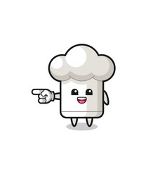 chef hat cartoon with pointing left gesture