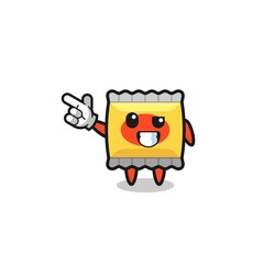 snack mascot pointing top left